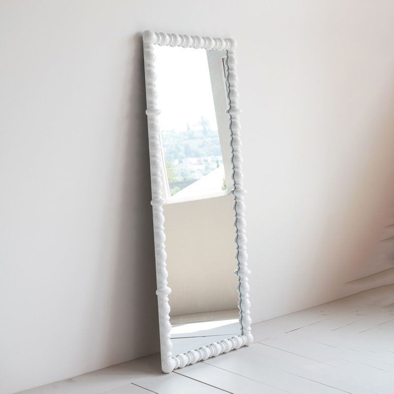 Miroir mural en bois tourné