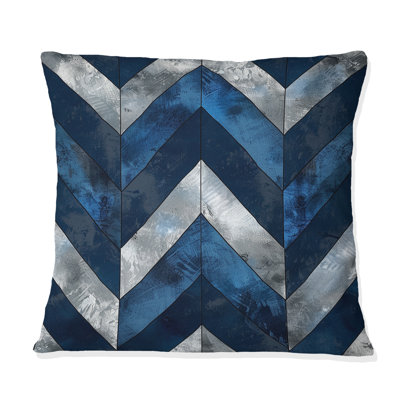 Coussin décoratif bleu à motif de chevrons bleu V