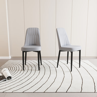 Ensemble de 2 chaises de salle à manger modernes en similicuir avec coussins épais et pieds en métal pour plus de confort et de style