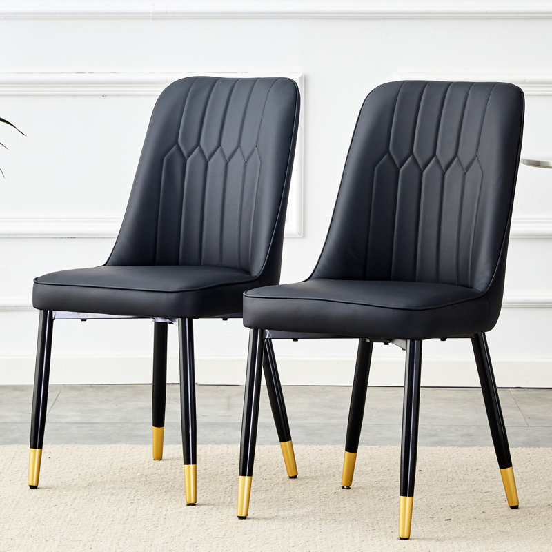 Chaises de salle à manger contemporaines noires avec pieds en cuir et en métal pour un espace de détente élégant salon moderne