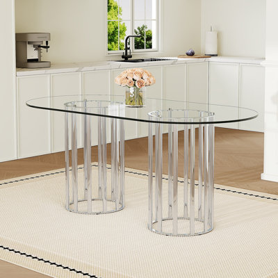 71 Inch Oval Tempered Glass Dining Table,Silver Double Column Light Luxury Style,Tempered Glass Scratch Resistant And Easy To Clean.Suitable For 6-8 People Dining,Modern Light Luxury Restaurant Table.
