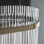 Geira 4lt Pendant light finished in Ant. Brass