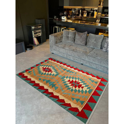 Tapis décoratif à motif tissé vert et orange