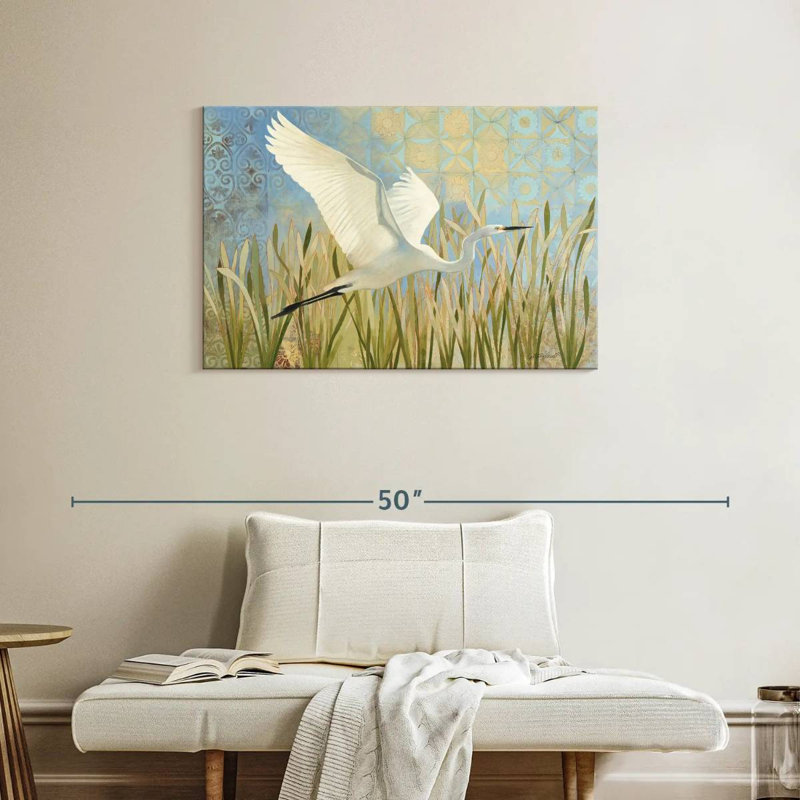 Aigrette enneigée en vol, H 24 po x l 36 po