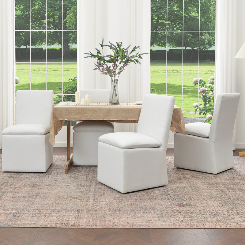 Chaise de salle à manger rembourrée en lin 21 po avec roulettes interchangeables et pieds fixes (ensemble de 4)