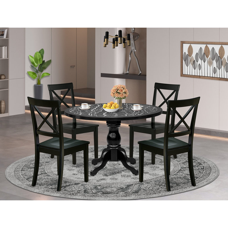 L'ensemble de table de salle à manger 5 pièces comprend une table de salle à manger à piédestal et 4 chaises de salle à manger à dossier en X au fini noir.