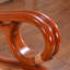 Chaise berçante en rotin naturel
