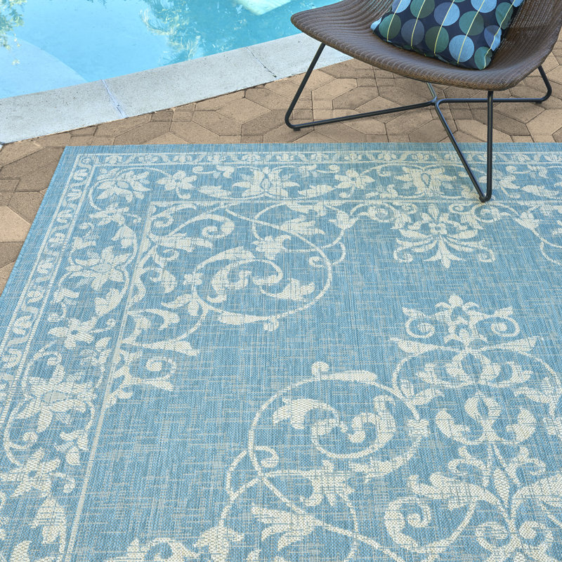 Tapis intérieur / extérieur en polypropylène tissé à plat à motif médaillon traditionnel beige crème Oasis Solterra Viala