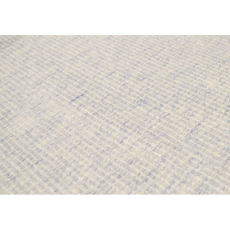 Tapis bleu de haute qualité noué à la main