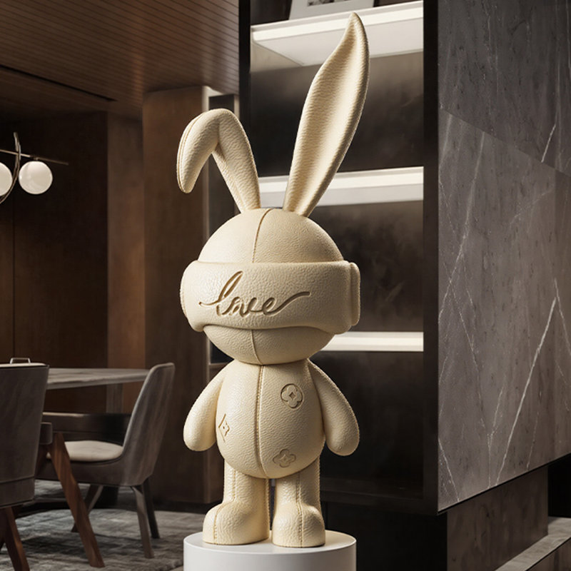 Lapin pelucheux en résine, Beige