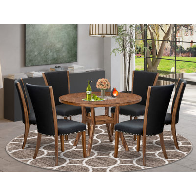 BE951177E98F4653B5EB0FF89B3E612F Dining Set - A Round Kitchen Table and Linen Chairs
