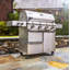 Saber 4-Burner Propane Gas Grill with Cabinet