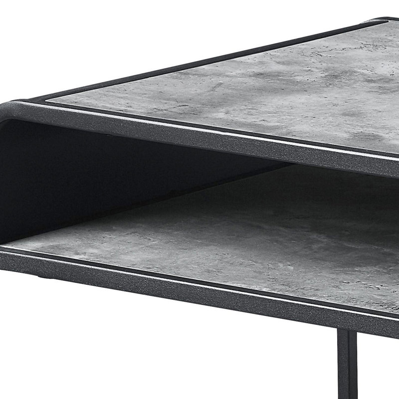 Table basse moderne en béton gris et noir avec tablette et base en métal pour le salon