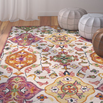 Tapis ivoire en laine touffeté à la main à motif floral Jahiem