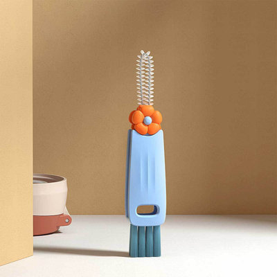 Bouteille d'eau trois-en-un brosse à couvercle multifonctionnel