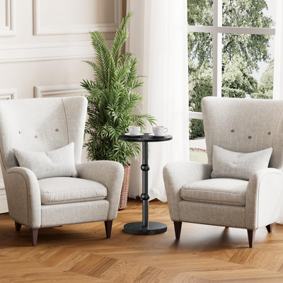 Petite table d'appoint ronde avec pieds en métal pour les petits espaces 