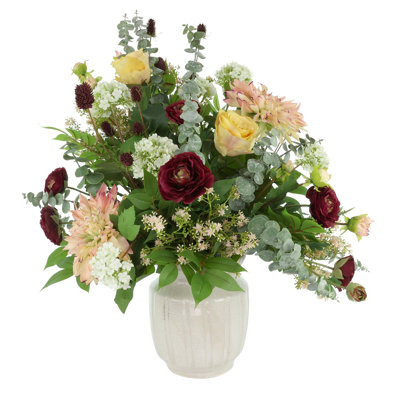 Dahlia, rose et renoncule dans un pot en céramique