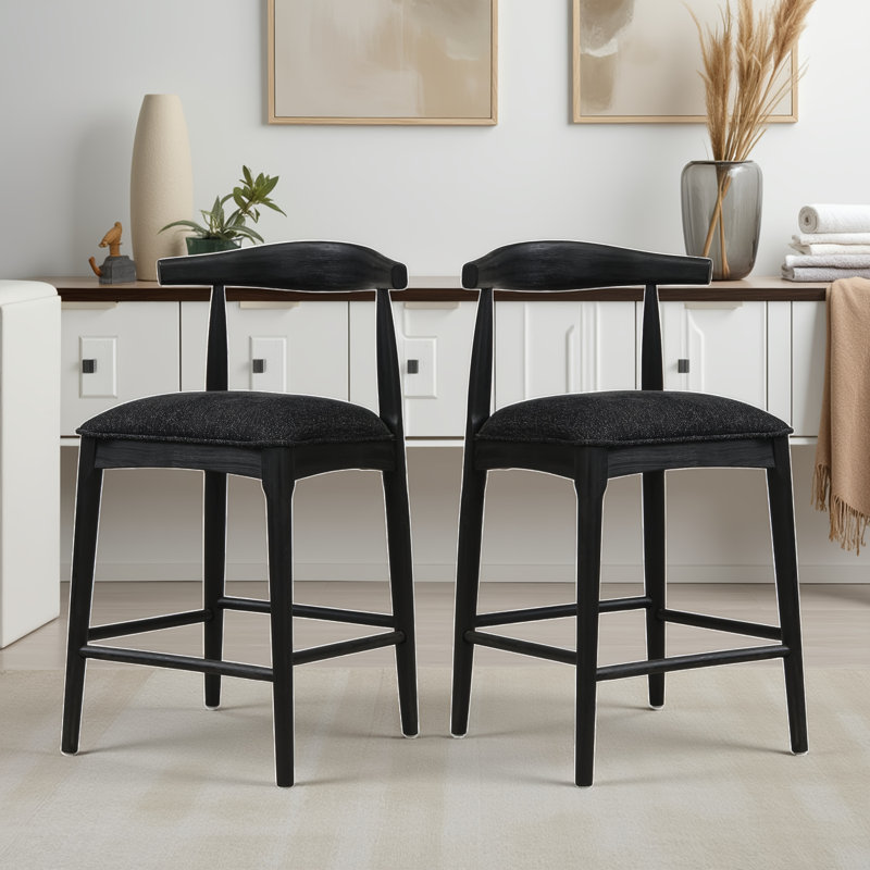 Ensemble de 2 tabourets de comptoir style Mid-Century recouverts de tissu noir, structure en bois d'hévéa et repose-pieds ergonomique