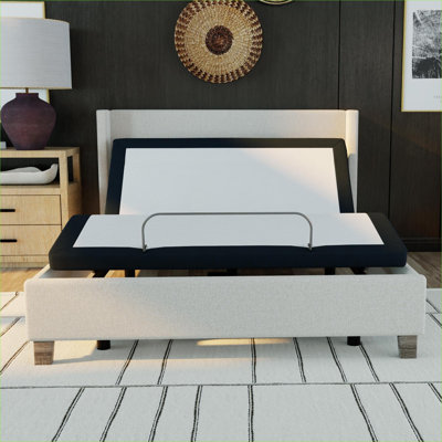 Pour une chambre à coucher pleine grandeur, une base de lit plateforme réglable en métal gris froid sans dégagement pour le repos quotidien