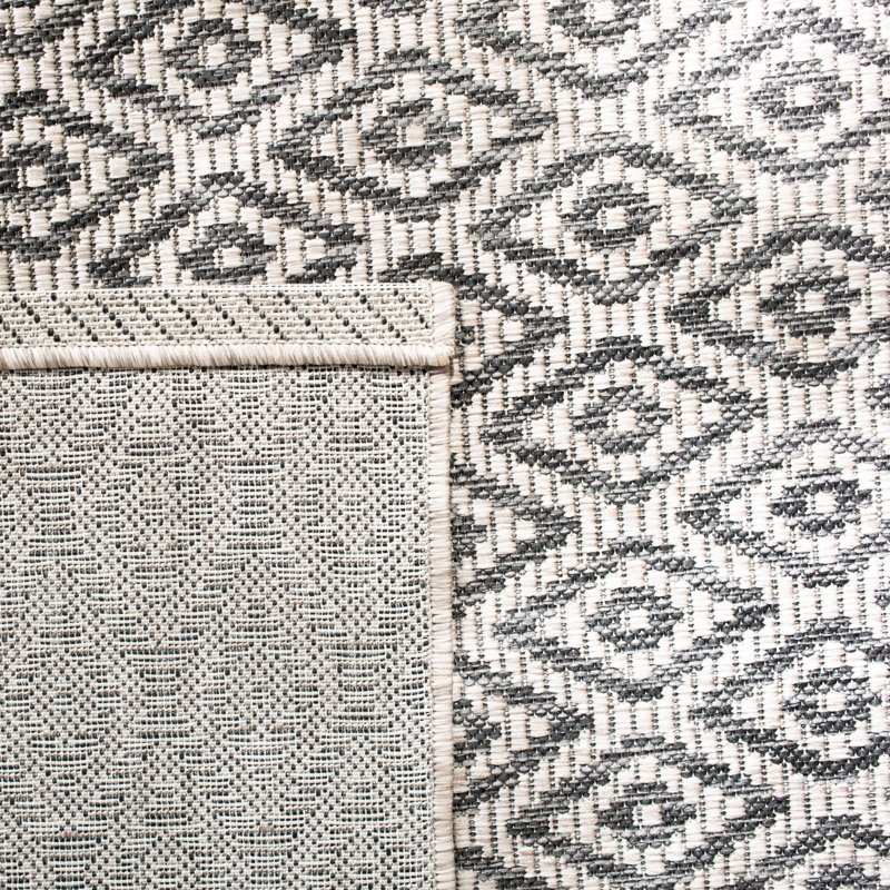 Arneshia Southwestern Navy Indoor/Outdoor Area Rug, Rectangle 8' x 11'