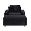 Canapé simple en velours côtelé noir avec un coussin, deux coussins décoratifs, un repose-pieds et deux espaces de rangement.