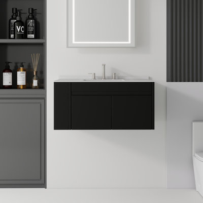 Meuble-lavabo flottant 36 po avec comptoir et dosseret en marbre de culture, armoire en contreplaqué, lavabo en céramique, 2 portes à fermeture douce, tablette latérale ouverte, noir