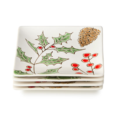 Ensemble de 4 assiettes Canapé Festive Blooms - quatre assiettes en grès blanc assorties de 6 pouces aux motifs botaniques audacieux, conçues pour les petites bouchées les plus charmantes de la saison.