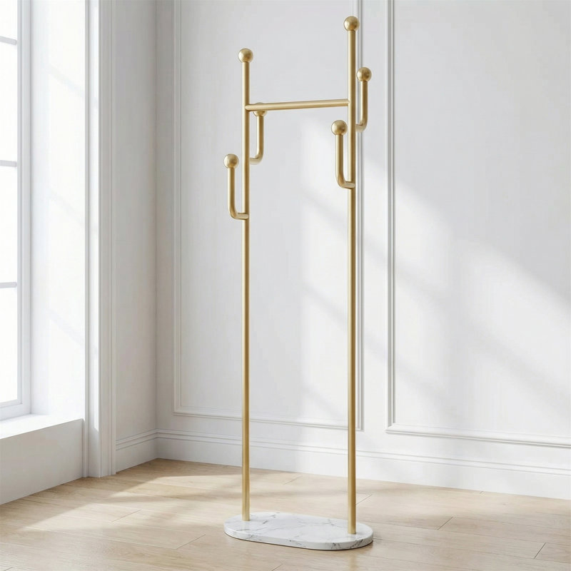 Freestanding Coat Rack With A Gold-tone Metal Frame And Marble Base, Suitable For Hats, Scarves, Jackets, And More