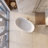 Knightsbrook 64" x 33" Freestanding Solid Surface Stone Resin Oval Double Slipper Diamond-Patterned Soaking Bathtub with Matte White Finish