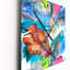 Plume d'oiseau en bleu et rose - Horloge murale traditionnelle-124864999