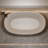 47-Inch Beige Freestanding Bathtub Of Resin Stone Solid Surface, With Overflow And Pop-Up Drain, Smooth Rounded Edges 47'' Soaking Bathtub, Slow Heat Dissipation, Easy To Clean