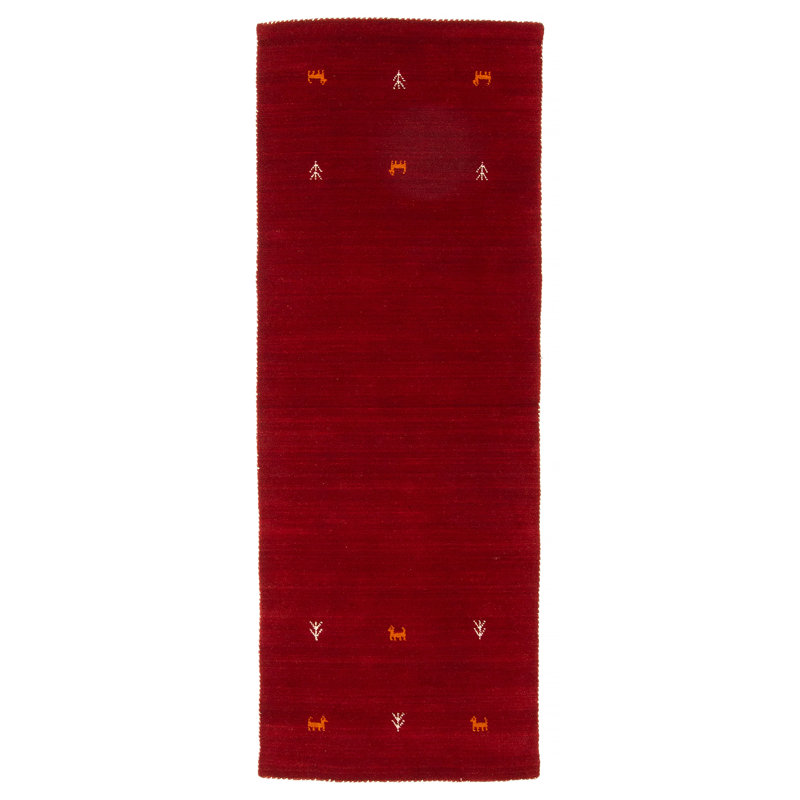 Les tapis Gabbeh sont fabriqués à la main avec des poils très hauts et des motifs très simples et stylisés.