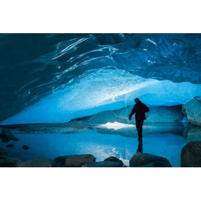 Exploring An Ice Cave In Norway by Wanderluster - Wrapped Canvas Print