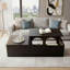 Table basse moderne à plateau relevable noir avec rangement caché, présentoir en verre arqué et incrustation élégante de trèfle