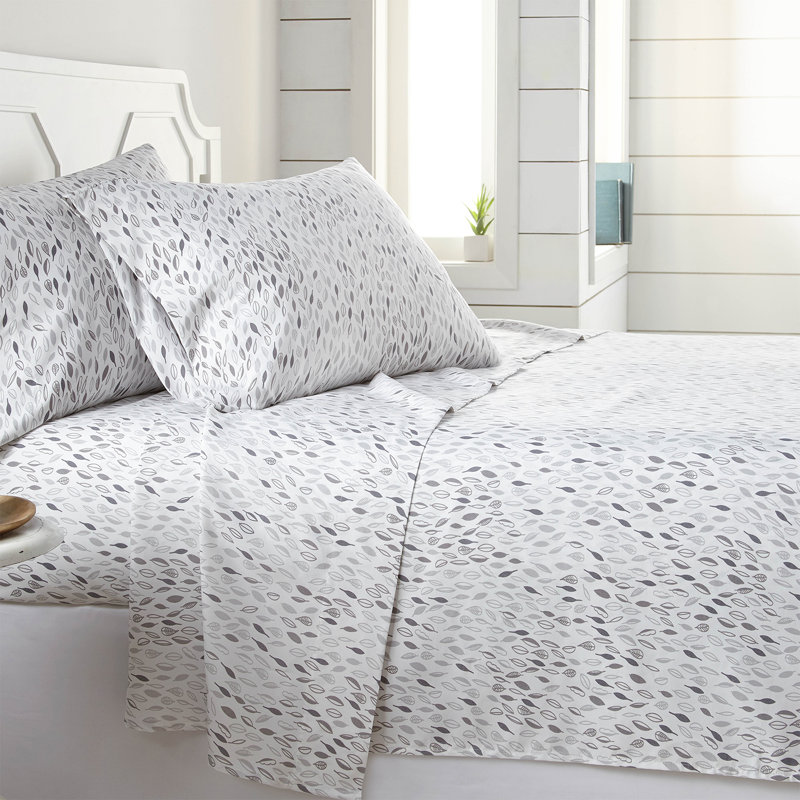 Ensemble de draps Southshore Fine Linens à motif botanique, blanc et gris, en microfibre doublement brossée 100 g/m², avec bonnet de 35,5 cm de profondeur, comprenant 1 drap plat, 1 drap-housse et 2 taies d'oreiller, format Queen.