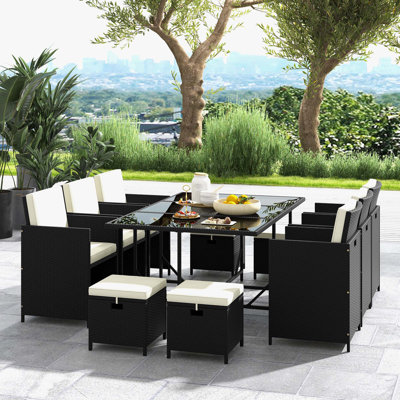 Elpida 8 - Person Patio Dining Set with Rectangular Table , Cushions Included
