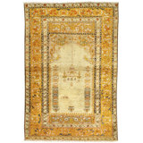 Hand Knotted Wool Area Rug in Ivory And Gold