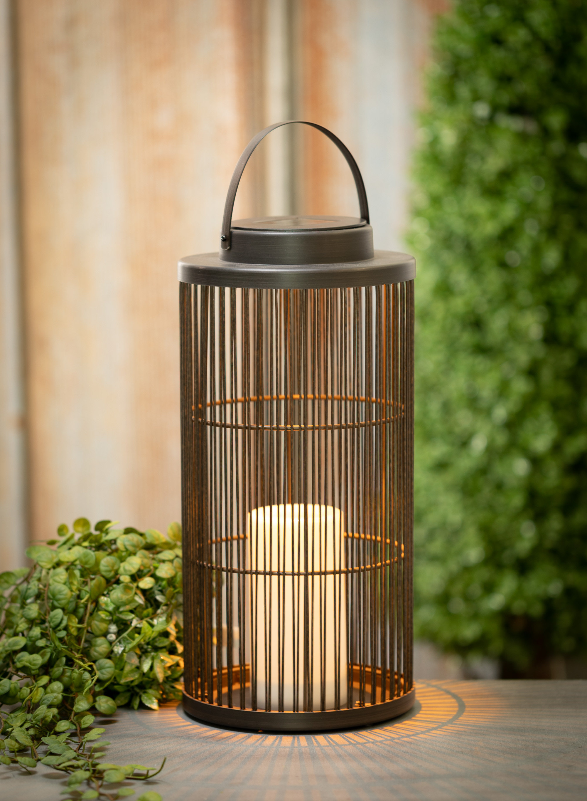 https://assets.wfcdn.com/im/75531130/compr-r85/1927/192764045/185-h-tabletop-lantern-with-candle-included.jpg