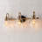 Almine 23" W 3-Light Iron Vanity Light with Textured Glass Shades