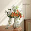 Ornements de fleurs simulées