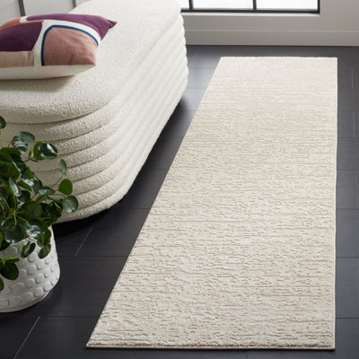 Tapis ivoire / beige en polyester / polypropylène tissé à la machine Tepui