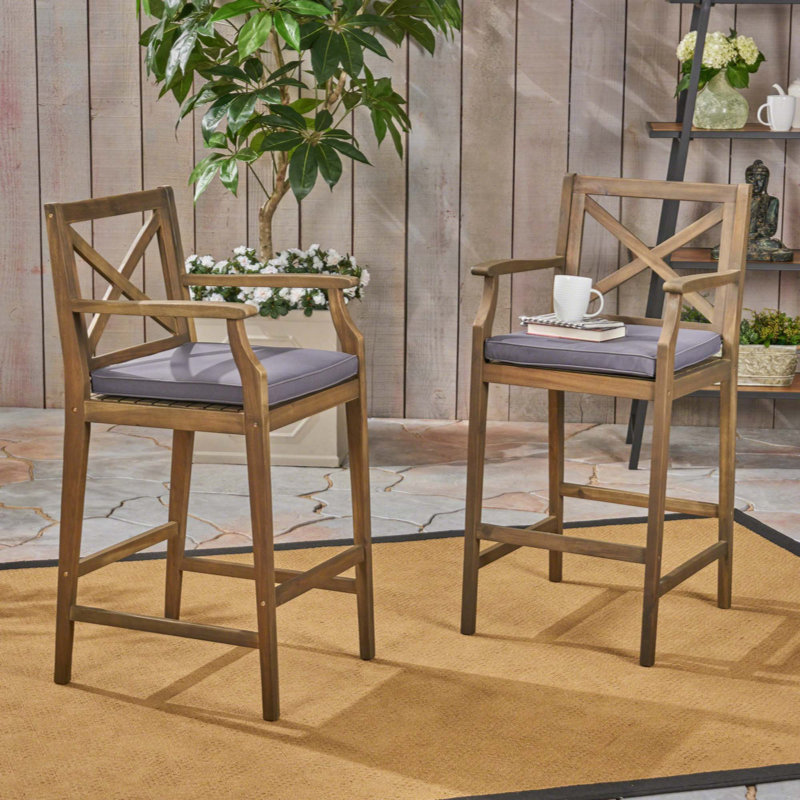 Ensemble de 2 tabourets d'extérieur en bois d'acacia avec coussins résistants à l'eau et conception à dossier en croix pour des sièges durables et élégants
