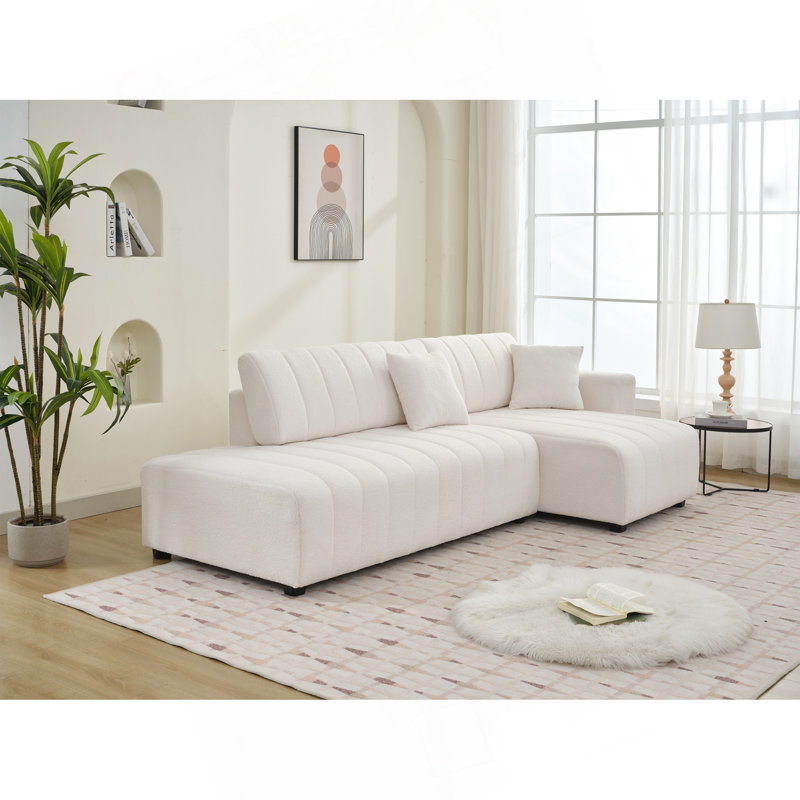Canapé d'angle capitonné en forme de L scandinave d'inspiration moelleuse avec coussins décoratifs, Laine ivoire