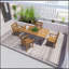 Table de salle à manger durable en teck avec pieds en aluminium en forme de X pour une utilisation à l'extérieur, parfaite pour la terrasse et le jardin.