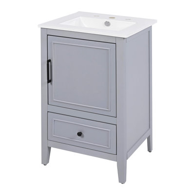 Meuble-lavabo élégant avec lavabo, rangement spacieux et design moderne pour un espace de salle de bain fonctionnel et élégant.
