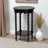 Garson Round Black Nightstand with Bamboo Inspired Legs and Open Shelf-117846556