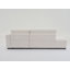 Canapé d'angle capitonné en forme de L d'inspiration scandinave avec coussins décoratifs