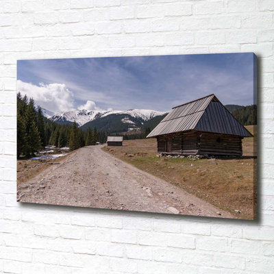 House In Mountains - Wrapped Canvas Print