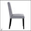 Ensemble de salle à manger 5 pièces avec table à finition noire et chaises en velours gris, parfait pour les intérieurs modernes et traditionnels.