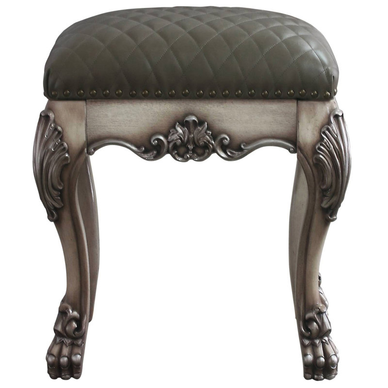 Tabouret de chambre gris et blanc rétro, ajoutant une touche classique à votre espace de mise en valeur